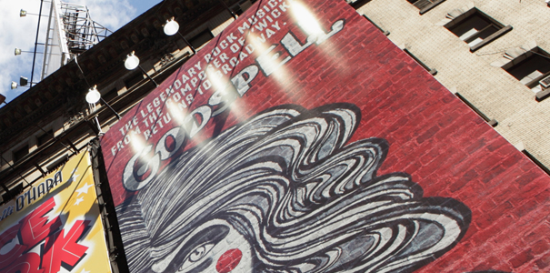 Godspell the musical marquis on front of a building