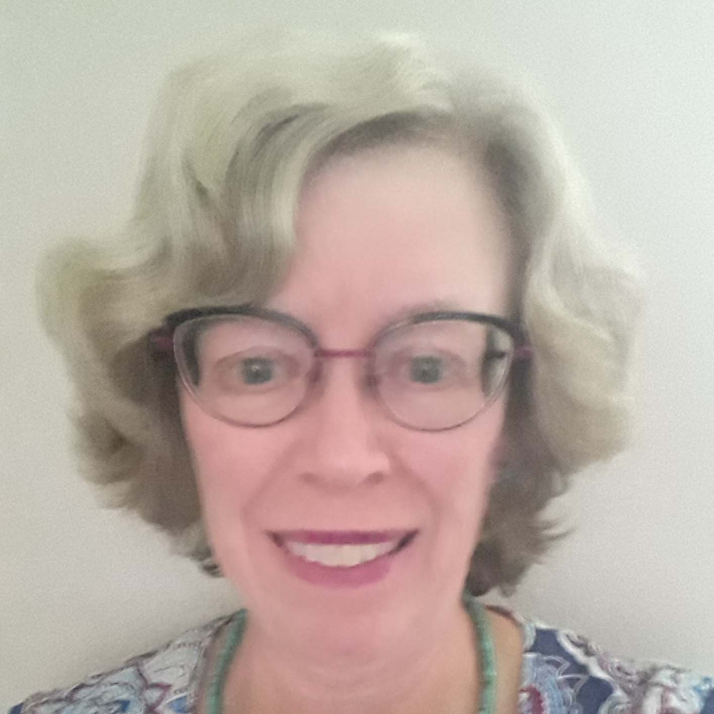 Mary Jo Drew, '79, smiles at the camera.