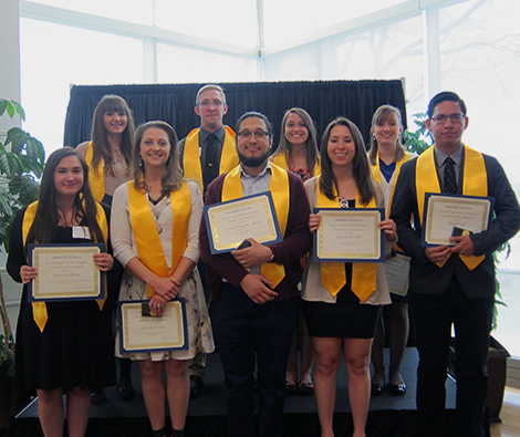 Upper Division Students holding certificates